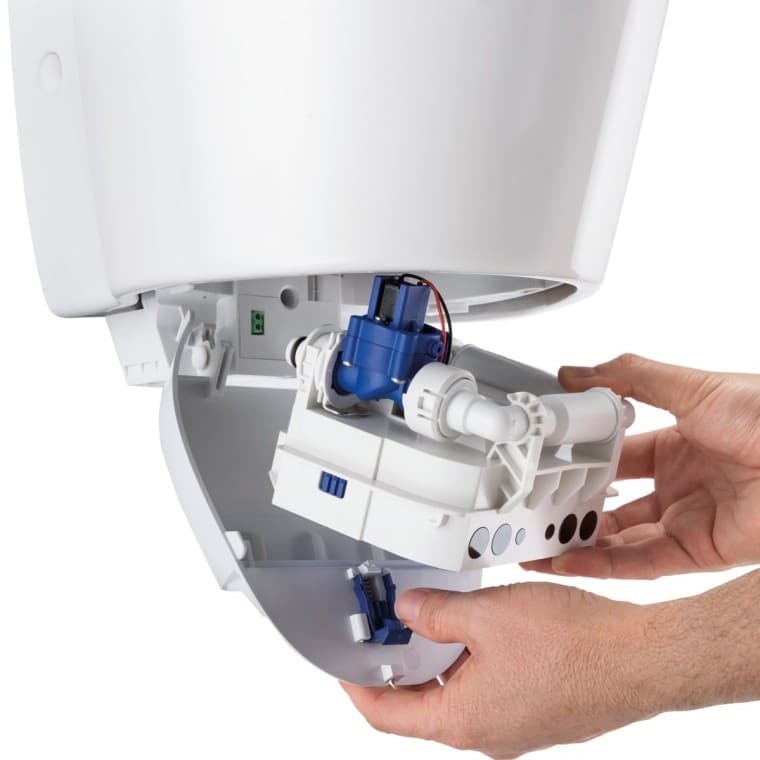 Geberit urinalstyrenhet i en dockningsstation Geberit urinalstyrenhet i en dockningsstation